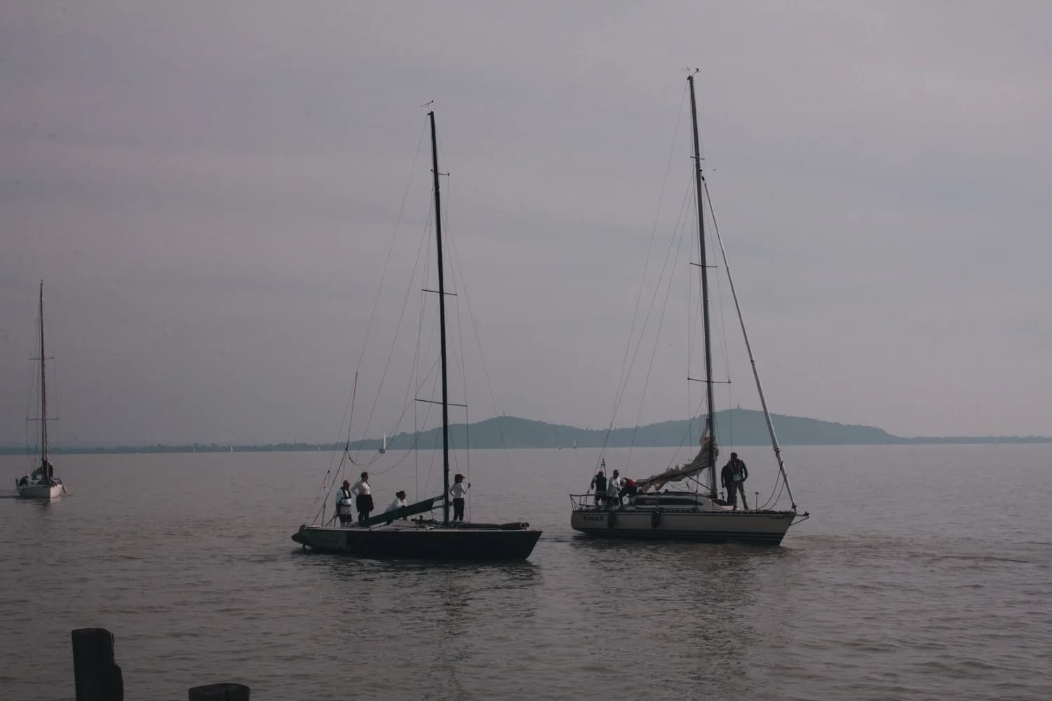 Yacht sailing away leaving a wake on the ocean